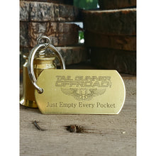 Load image into Gallery viewer, brass bell made of a .50 cal shell with brass tag that says &quot;Just Empty Every Pocket&quot;
